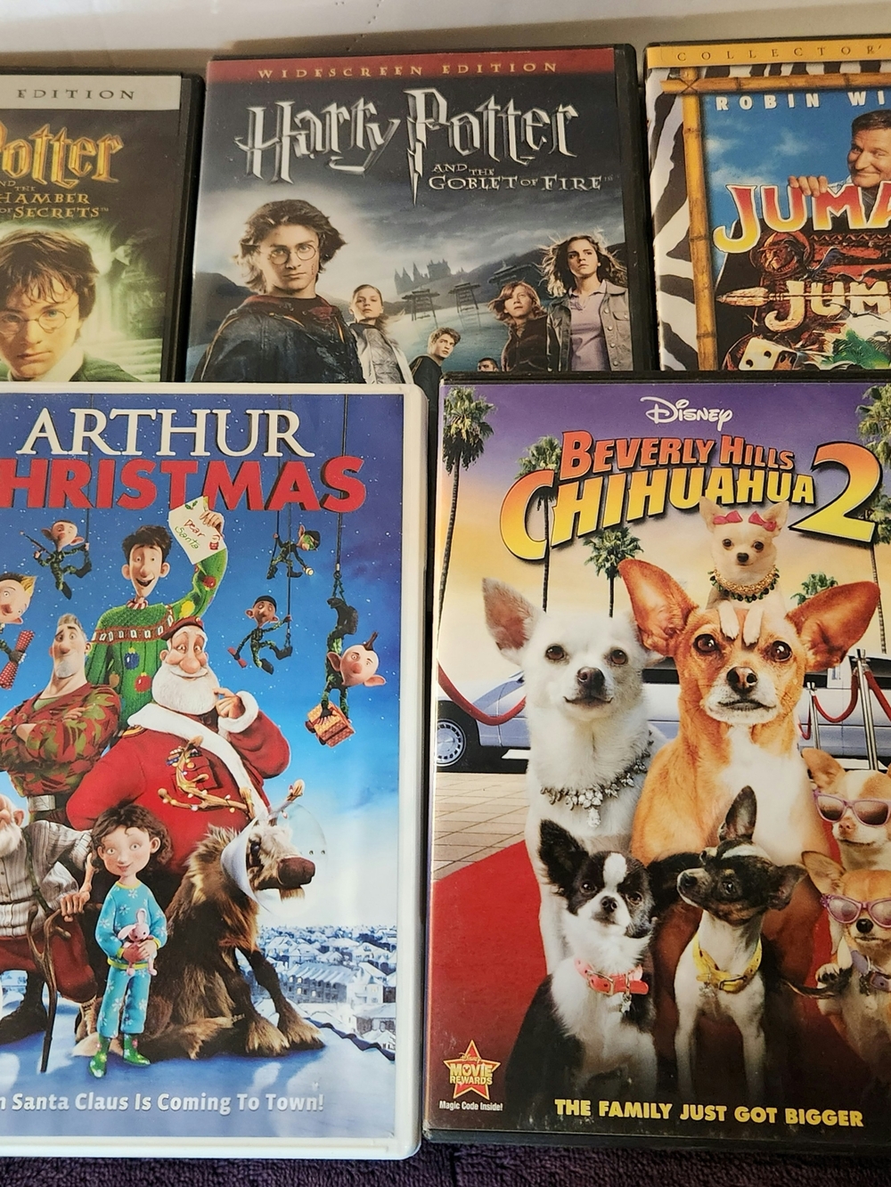 DVD Bundle: Harry Potter X2, Jumanji, Arthur Christmas, Beverly Hills Chihuahua